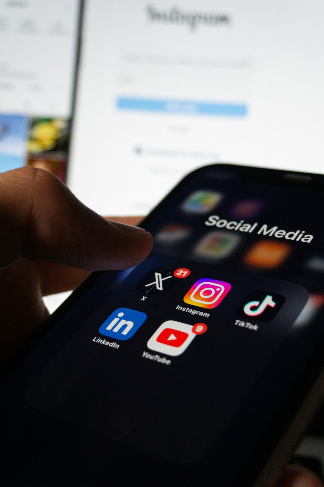 social media apps on the phone in dark ambience